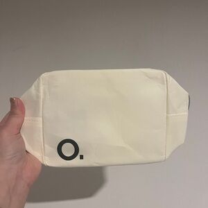Cream Pouch with Black Logo